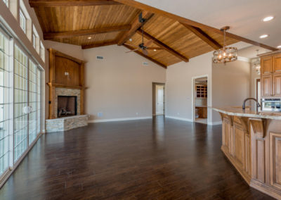 Great room with wood floors and fireplace
