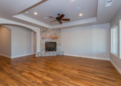Great room with fireplace and wood floor