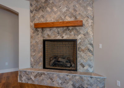 Chevron patterned stone fireplace