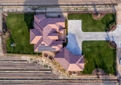 Arial view of farmhouse in field