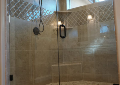 Tile shower with glass enclosure