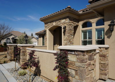 Side view of home with stone accents