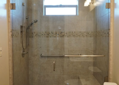Tile shower with glass doors