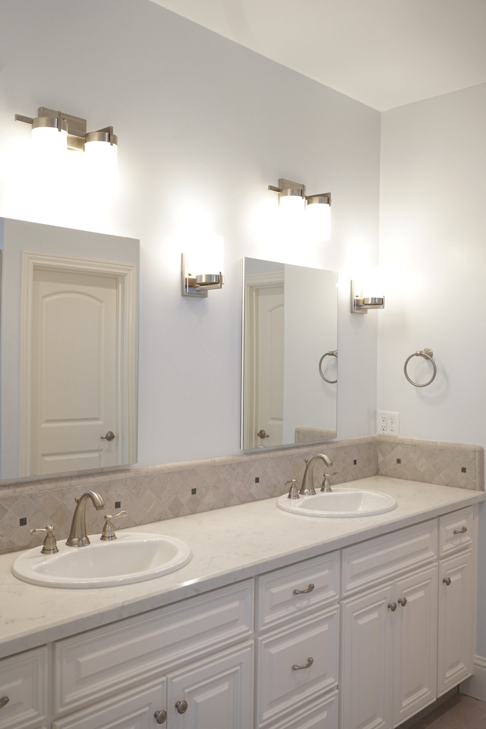 Bathroom with double sink and double mirrors