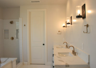 White bathroom with double sink vanity