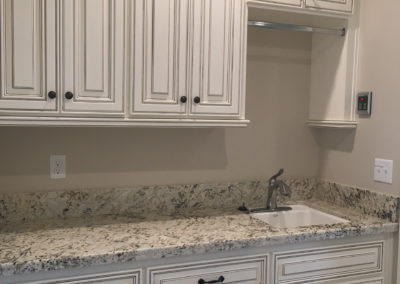 Laundry room cabinets and sink