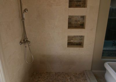 Open shower with built in shelves