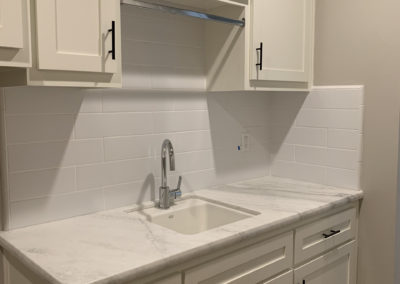 Laundry room cabinets and sink