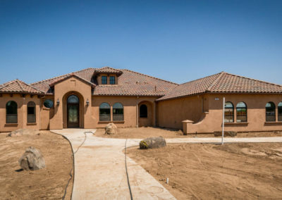 Newly constructed home on dirt lot