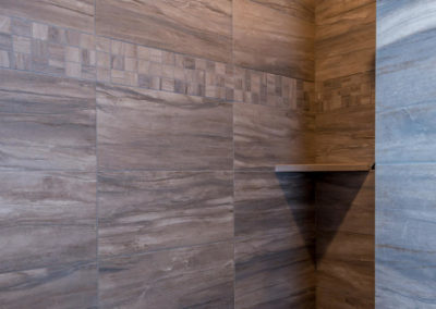 Grey tiled custom shower