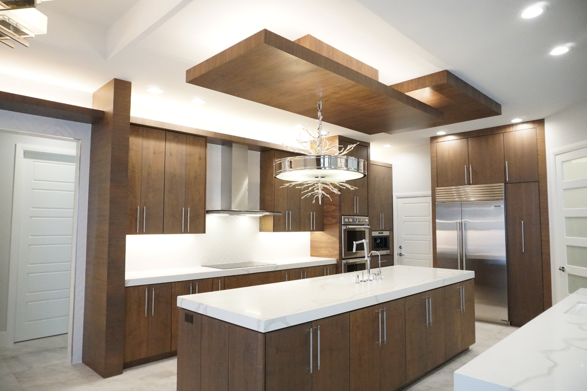 Kitchen with custom built in cabinets and island